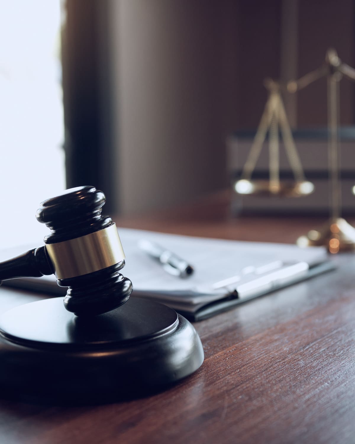 Evidence bag with a USB drive on a courtroom counsel table