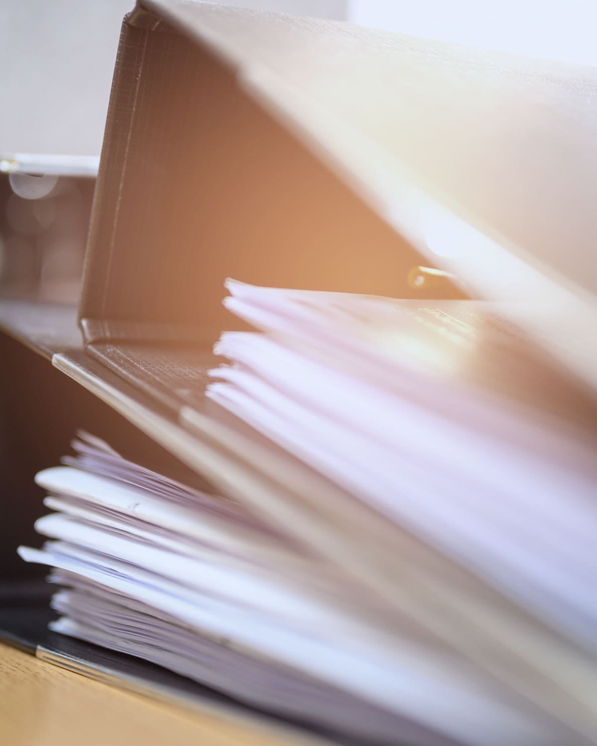 Workplace violence prevention plan binder on an office desk